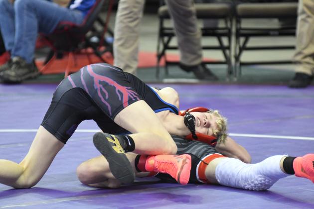 Gage Friesen won his first match at the state wrestling championships Thursday. 
