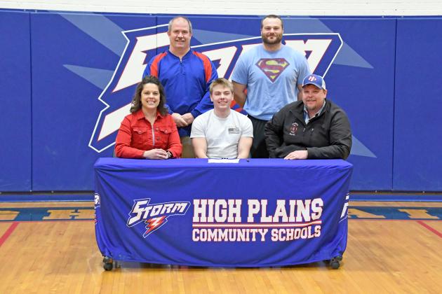 Lane Urkoski signed his letter of intent to join the Doane University football team joined by his parents, Kevin and Shelly as well as High Plains football coaches Greg Wood and Jon Bos. 