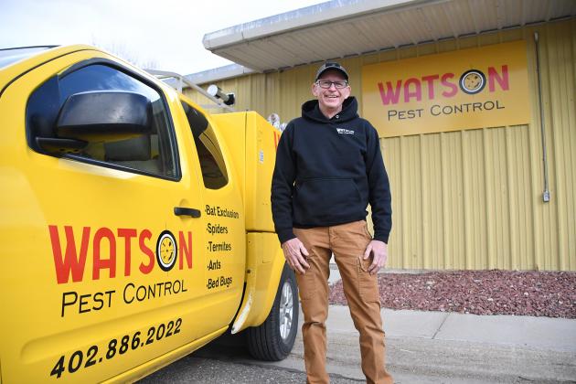 Randy Watson stands outside the warehouse in Phillips that now bears the name of his new business, Watson Pest Control.
