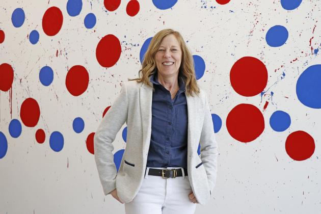 High Plains art teacher Fran Lott is set to retire at the end of this school year, after 39 years in the profession. She is pictured here in front of a red and blue dotted wall mural, painted by students, that will someday be used to display student art.