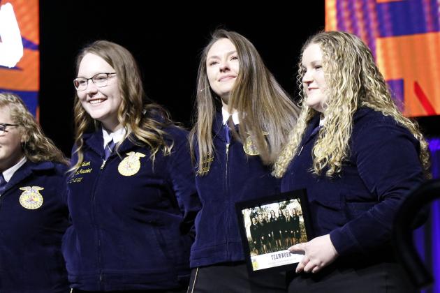 A teary-eyed Ellie Wanek was thanked by her state officer team after completing her retiring address at the 94th annual Nebraska FFA State Convention.