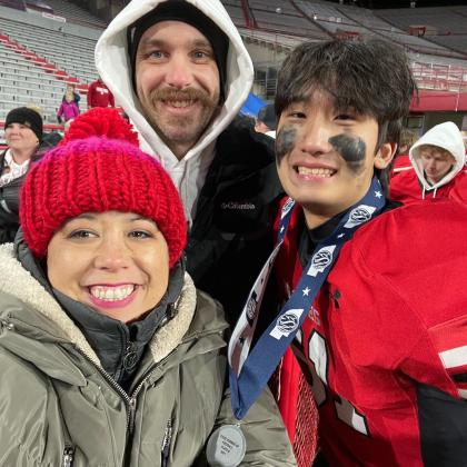 A member of the Aurora High School varsity football team, Yoonsang was congratulated by host parents Maile Ilac-Boeder and John Boeder after his team finished as Class B runner-up.