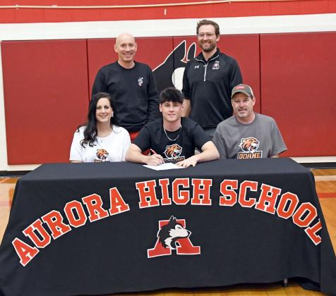 Cauy Walters signed Thursday to join the Doane University golf program alongside his parents, Jad and Kristi as well as Aurora golf coaches Craig Badura and Brandon Timm. 