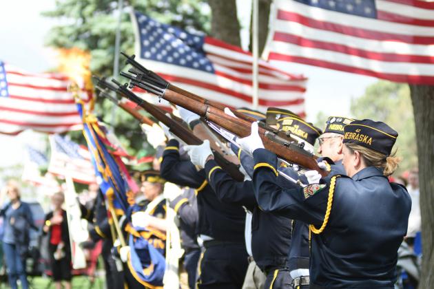 Members of the veteran firing squad give a 21-gun salute towards the end of the Memorial Day ceremony. Afterward Byron Paschke played Taps.