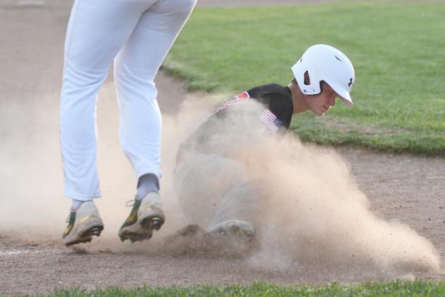 Layton Hohm slid into third base just before his opponent had a chance to catch the incoming ball.