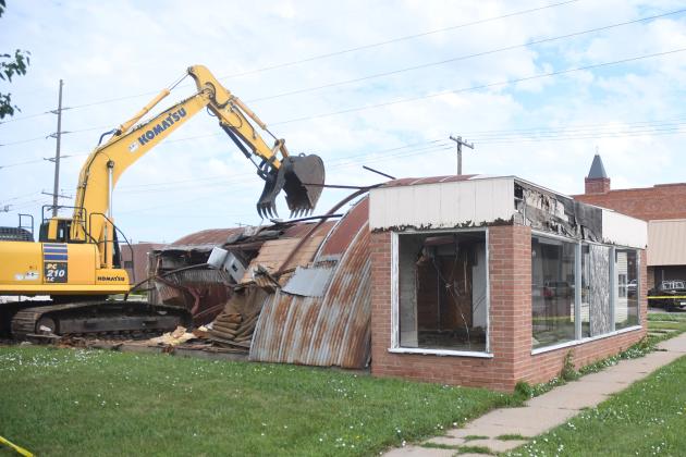 A building that has housed numerous businesses since its construction in 1956 came crashing down last week. Mike Nelson Land Development crews demolished the building, which had stood mostly vacant since 2012.