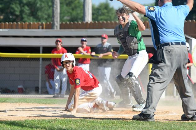  Lucas Fry slides under the tag for an Aurora run during a 13-5 loss to Central City in the opening round of the Class B, Area 4 tournament Friday.