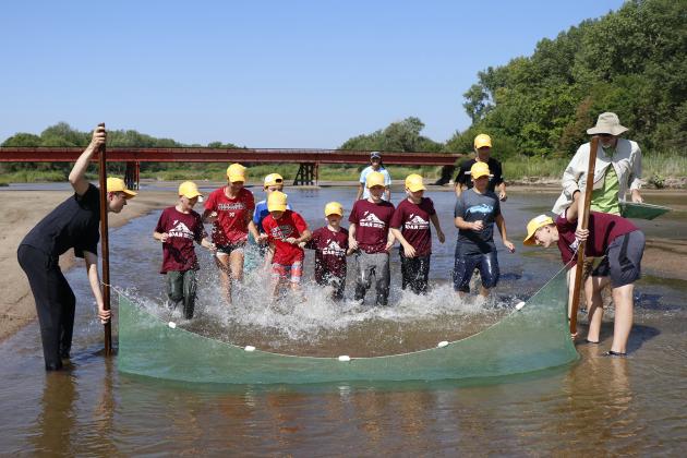 SOAR campers of all sizes enjoyed refreshing runs through the Platte River on Friday’s “river day.” This included rushing a fishing net in an effort to corral what they could to catch and observe later.