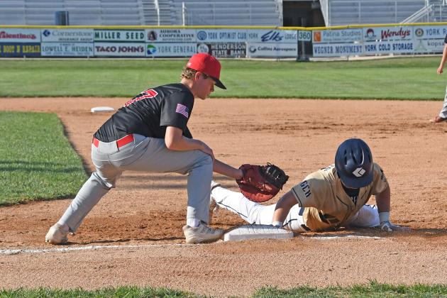 Aurora Pinnacle Bank Senior Layton Hohm gave good effort in covering first base for the team during Friday’s matchup against York.