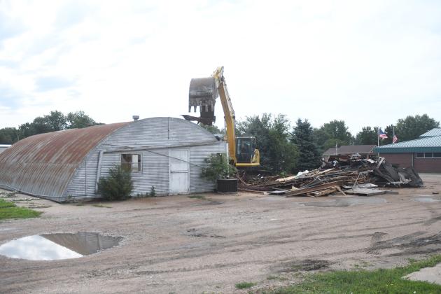 A building that has housed numerous businesses since its construction in 1956 came crashing down in July, one of many developments highlighted during an annual report of Aurora Development Corporation activities to the Aurora City Council. 