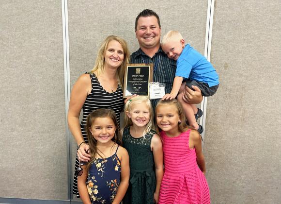 Aurora choral director Jason Frew, pictured with his wife Kristin and their children, was recognized in July as the 2021 Nebraska Choral Directors Association’s Young Choir Director of the Year.