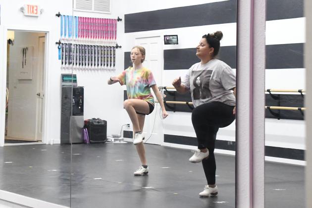 Lola Nissen (left) and Ashley Parker (right) tapdance to the song “You Make Me Feel Like Dancing” by Leo Sayer as part of a personal lesson during the summer. 