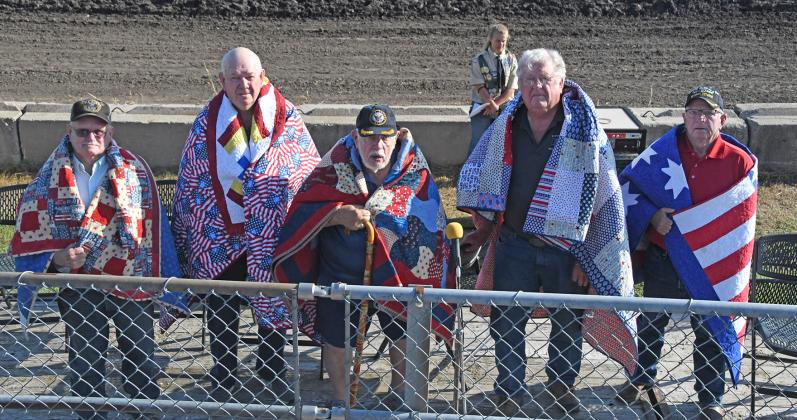 Local veterans receiving their Quilt of Valor during Thursday’s opening ceremonies at the Hamilton County Fair included, from left: Tom Collingham, Glenn Rauert, Jim Anderson, Richard Schaffert and Mike Fletcher.