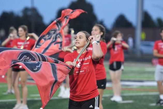 Junior Kaitlyn Hunter is a member of the flag corps.