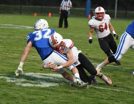 Aurora senior Damien Stanley makes a sure-handed tackle as part of a Husky defensive effort holding Ashland-Greenwood to 94 rushing yards in a 33-14 win Friday.