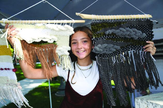 Annaston John was the youngest participant in last year’s Aurora Art Walk. At the age of 12, the Hampton middle school student displayed her weaving talents.