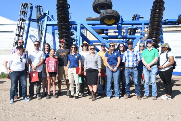A large group, including NASA Earth Science Director Karen St. Germain (front, center) visited the Hunnicutts farmstead outside of Giltner.