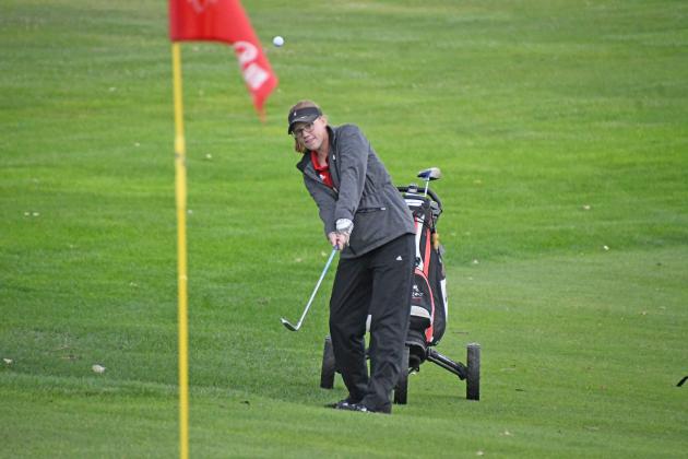 Aurora senior Laura Hansen played her final round carrying a Lady Husky golf bag at last week’s B-3 District meet, where she shot her best ever score of 117.