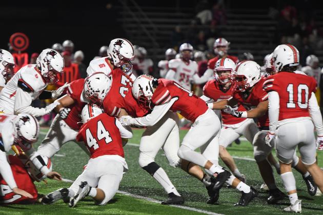 Fairbury’s Jackson Martin found no room to run against a Husky defense which held the Jeffs to 13 rushing yards Friday night.