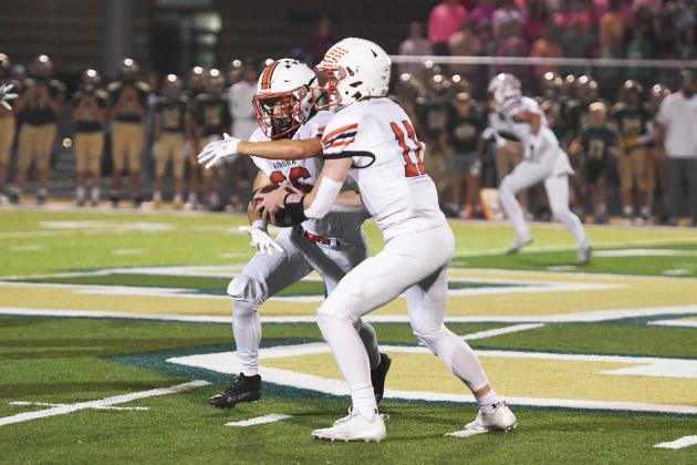 Quarterback Drew Knust and running back Maddex Egger stepped up in a big way Friday, combining for seven rushing touchdowns to lead the Huskies to a 49-21 win over Central City.