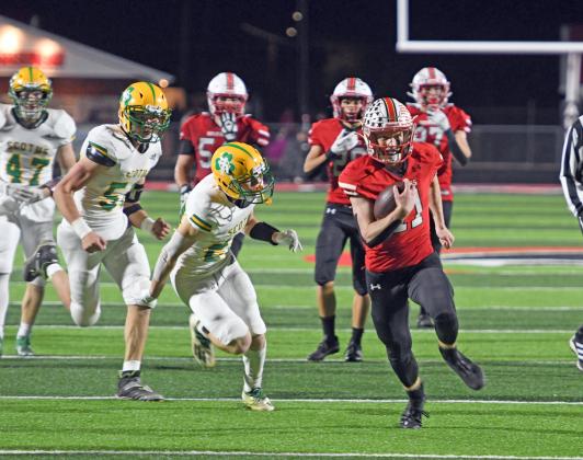 Drew Knust rushed for over 100 yards and scored three total TDs in Aurora's 43-13 win over Scotus Central Catholic Friday. 