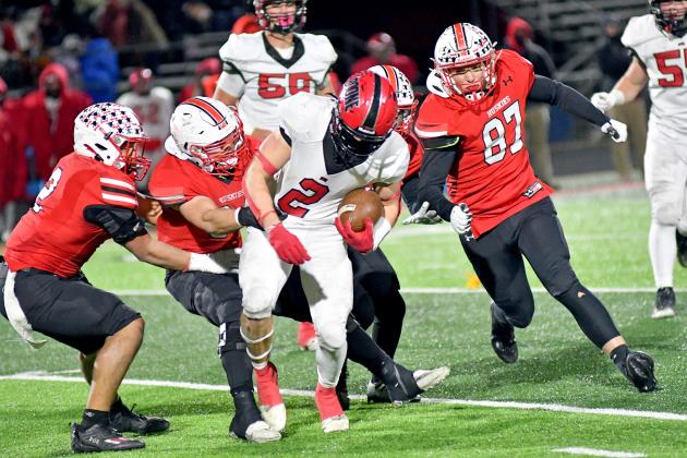 Aurora’s defense swarmed to the ball all night long in the Nov. 18 C1 semifinals against Boone Central, and will be put to the test Tuesday in the state championship game against Pierce at Memorial Stadium.