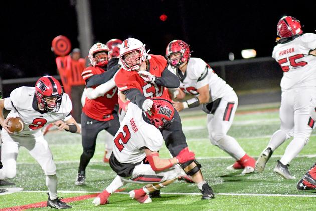 Jack Allen (50) was a menace to Boone Central, blocking a third quarter punt that was recovered for a Husky touchdown. 