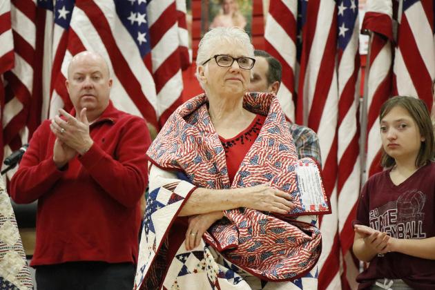 Local veteran Pat Nuss was honored with her Quilt of Valor during last week’s Veterans Day program at Aurora High School. Nuss was moved by the outpouring of support showed by her community. See related story on Page B5.