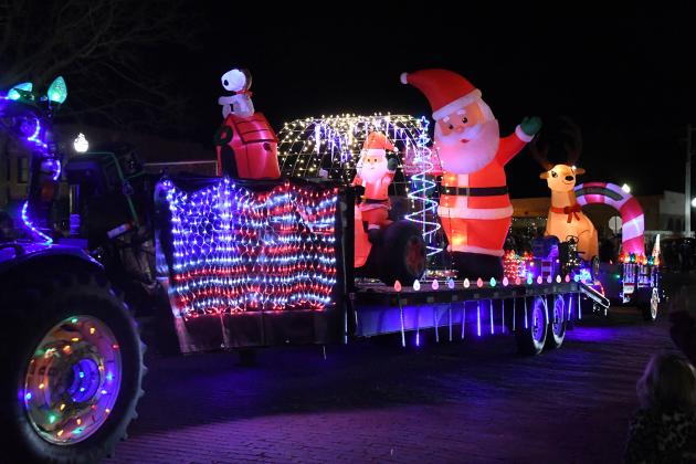 Paul Badgett of Aurora upped his game for this year’s lighted tractor display, combining large blow-up characters with various light displays to create an entry that tied for first place.