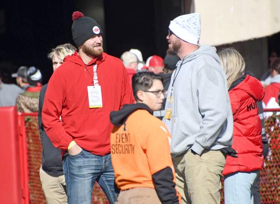 Austin Allen (left) watched his former Nebraska teammates from the sidelines against Minnesota Saturday. 