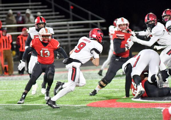 Aurora's Kendrik Owens makes a play in the backfield in Aurora's 40-19 win over Boone Central.