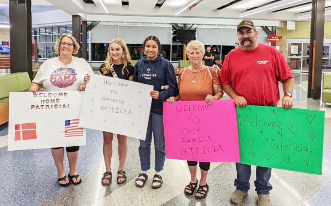 Upon arrival in Nebraska, Danish exchange student Patricia Paranabas (center) was greeted by her host family, including, from left: Dawn Brandt, Maggie Brandt, Sandy Wicht and Jeremy Brandt. 