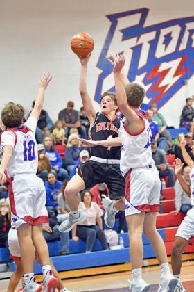 Giltner’s Phillip Kreutz scored a game-high 18 points, including this runner through the lane during the Hornets’ 45-34 win at High Plains Friday.