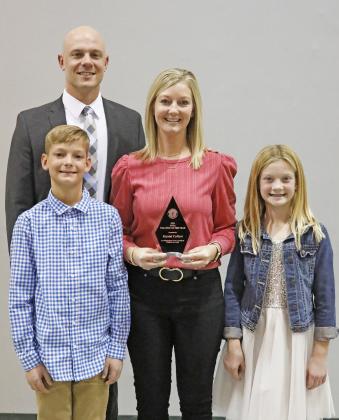 Iowa Teacher of the Year Krystal (Beed) Colbert, pictured here with her husband, Jason, and children Jamison and Emersynn.