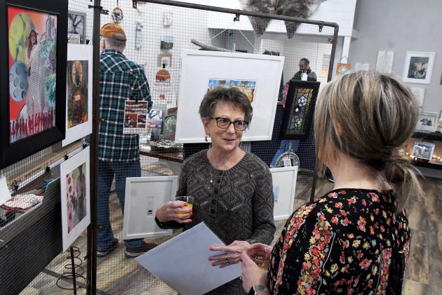 Mary Mattner talks with co-owner Desiree Christenson at the closing event for Cottonwood Gallery & Arts on Saturday. Both co-owners Christenson and Tori Swanson stated desires to stay close with the art community in Hamilton County. 