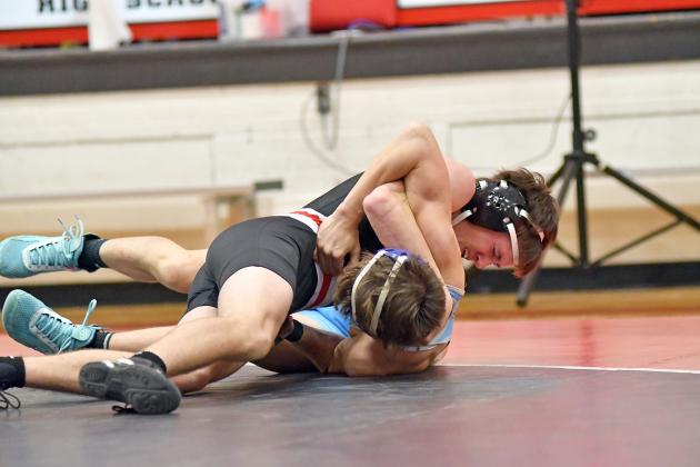 Brett Mellies picked up a first period pinfall victory over Columbus Lakeview’s Dustyn Lusche during a dual at Aurora Thursday. Mellies joined Jack Allen as Aurora wrestlers to win contested matches against the Vikings. 