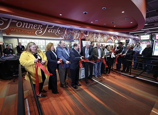 Several Grand Island area representatives cut the ribbon, officially opening the Grand Island Casino Dec. 27.