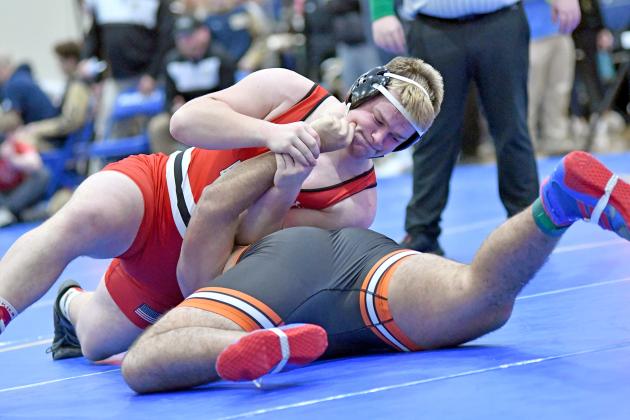 Aurora’s Jack Allen won Central Conference heavyweight gold Saturday in Seward, defeating GINW’s Victor Isele in the finals. Allen holds the edge in the season rivalry over Isele, 3-0. 