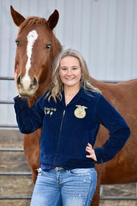 High Plains Community School FFA president Kyleigh Farley with a horse named Chick. Farley has a love of animals and a stated desire to have more students join FFA.