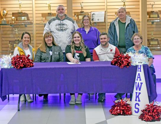 Hampton senior Shayna Klute signed on to participate with the cheer team at Hastings College Feb. 7. 