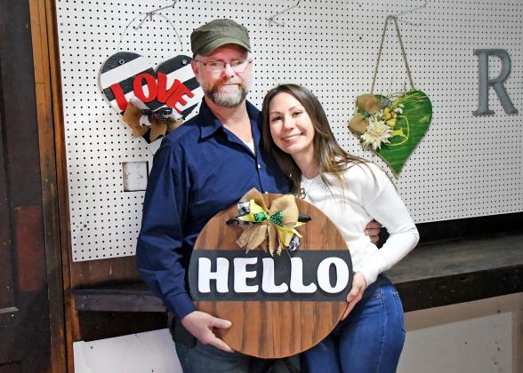 Levi Reyner and Brandy Rima stand in their workshop on Reyner’s farm near Marquette, where the business partners have begun creating products for their new business, It’s the Little Things.