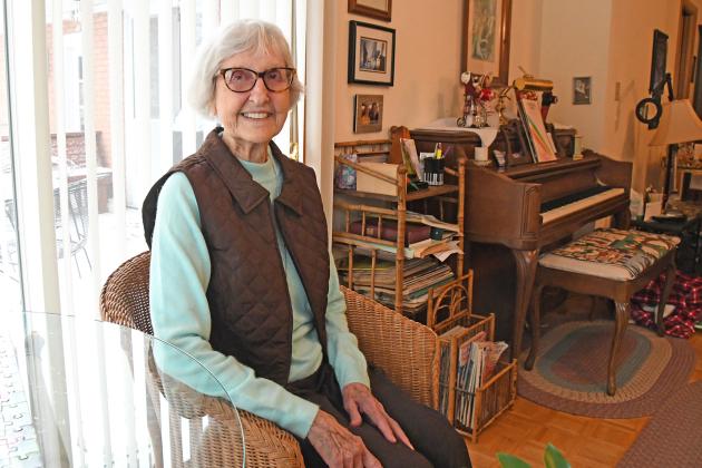 Shirley Barnell at her home in Aurora next to her piano and deck. Barnell lives in the same home as when she moved to the area in 1950. 