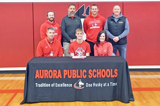 Carsen Staehr signed with the University of South Dakota’s track team alongside his parents, Jay and Kim, as well as Aurora track coaches AJ Farrand, KC Lathrop, Cole Carraher and Gordon Wilson. 