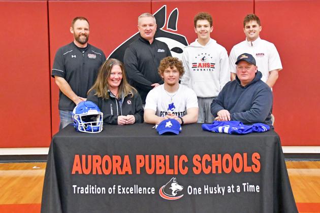 Aurora senior Britton Kemling signed with Peru State College last week to play football alongside his parents, Chuck and Rene, brother Lincoln, Aurora coaches Kyle Peterson and Cole Ashby as well as Bobcat coach Phil Ockinga. 