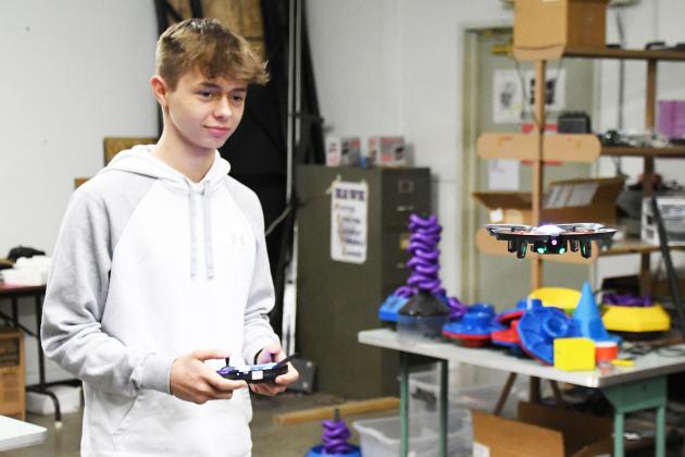 Grant Ferguson pilots a drone at Hampton Public School. Besides the competitions, science teacher Gary Richards said that he was excited to see how students applied drone programming skills toward future careers. 