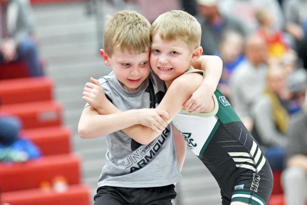 Callen Dinville got aggressive early with a takedown and looks for a pinfall over Central City’s Beckham Butt at Friday’s youth wrestling tournament.