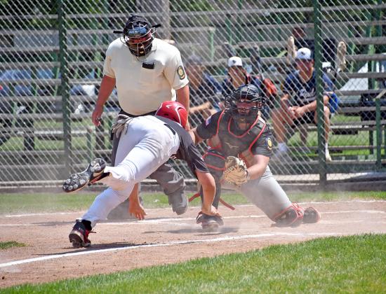 Dylan Dubas waits at the dish for an incoming Sutton baserunner for a crucial out during Aurora’s 8-1 loss Saturday to Sutton in the second round of the B5 area tournament played at Central City. 