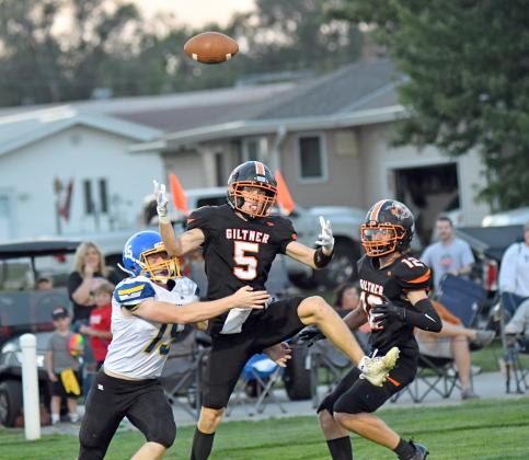 Marshall Humphrey (5) and Blaydon White break up a pass in the end zone during Giltner's 28-16 win over Nebraska Lutheran. 