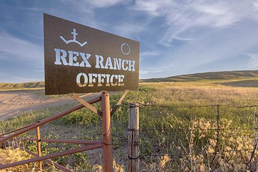 The sign at the entrance to Rex Ranch. The Church of Jesus Christ of Latter-day Saints, commonly known as the Mormon church, now owns this ranch and a total of at least 365,000 acres of Nebraska agricultural land. In the past five years, it is the No. 1 buyer of ag land by acre in Nebraska. (Photo by Carrie Ryan, courtesy of AgReserves)