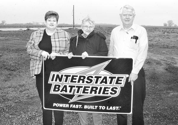 This photo, taken in 2003, shows Interstate Battery owners, from left: Paula Danhauer, the late Dee Koberstein, and Lee Danhauer, standing on a Highway 14 site where construction was about to begin on a new location. Dee and her husband, Bob, moved from Florida to Aurora in 1973 to establish a business which marked its 50th anniversary last year. Zack Danhauer is now the franchise distributor, representing the third generation of family ownership.